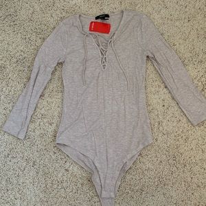 Forever21 lace up tan bodysuit